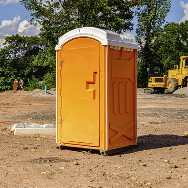 how often are the porta potties cleaned and serviced during a rental period in Windfall